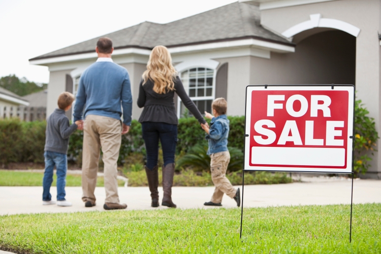 Family looking at house for sale