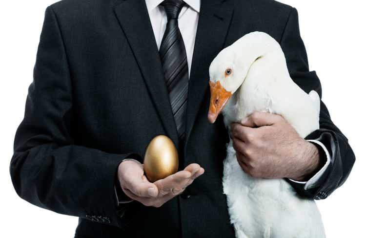 Businessman with golden egg