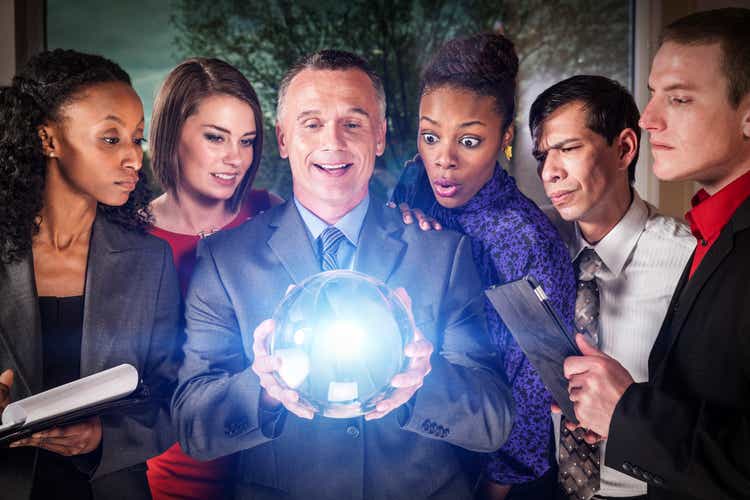 Business Team with Crystal Ball