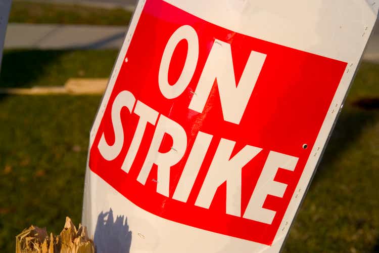 On a Strike sign in red and white poster