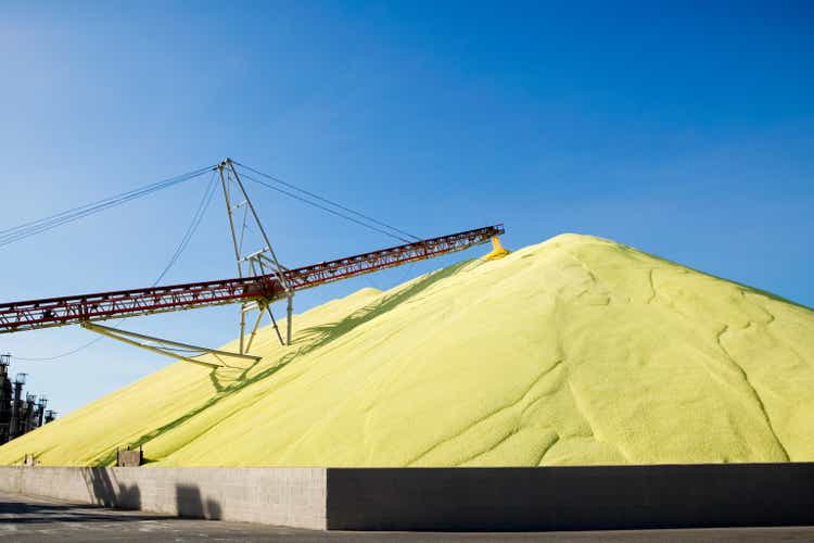 Massive mound of industrial sulfur at worksite