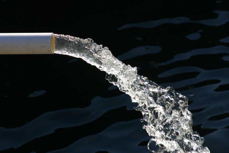 Close-up of water pipe with pouring water