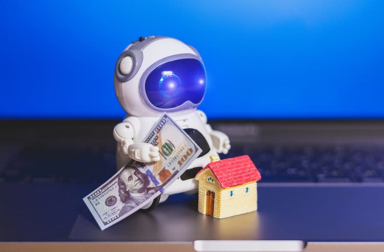 Robot with dollars money and house.Buying and renting real estate. Bank credit for property. Save money. Digital development.