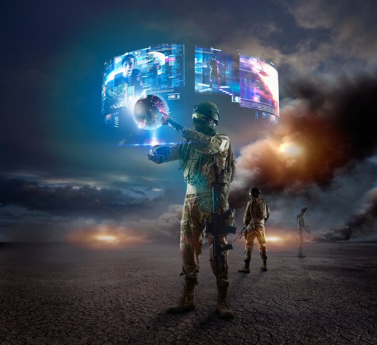 Caucasian soldier using holographs in combat zone