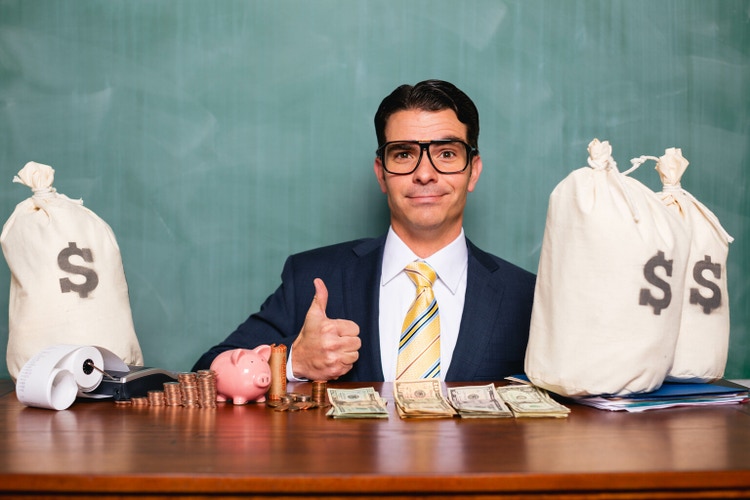 Businessman with Money Savings