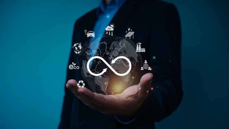 Infinity symbol with ESG environmental protection concept. Businessman analyze investment sustainability, sustainable development, climate change, green energy recycle, Net zero and carbon neutral.