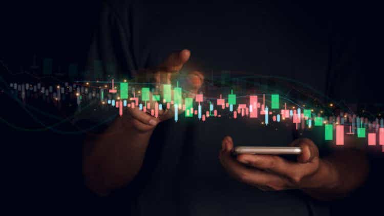 Businessman sets target analysis charts and graphs of developing stock market and global economic growth. Targeting growth ideas from large enterprise business valuations