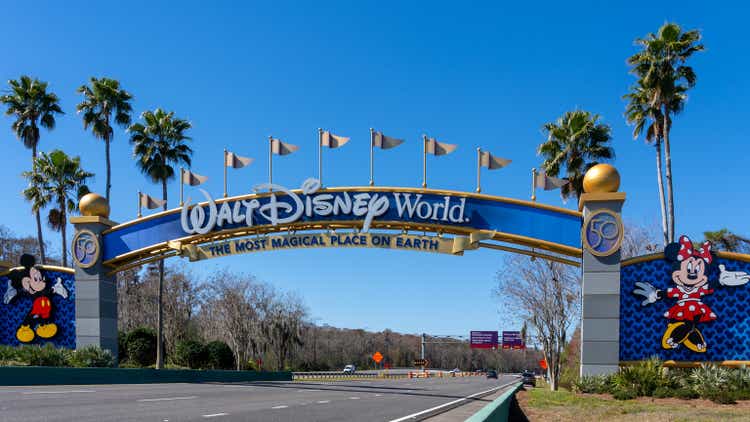 A Walt Disney World arch gate on the street in Orlando, Florida, USA.