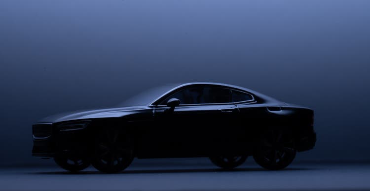 Model studio image of a black Polestar 1 hybrid sports coupé car..