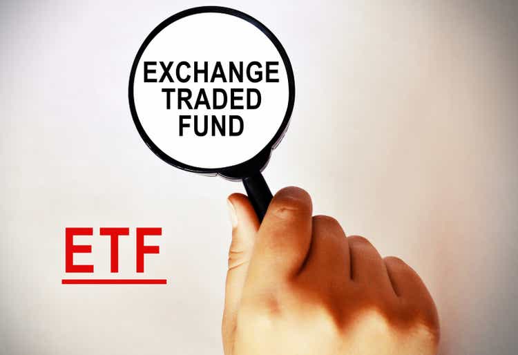 Magnifying Glass showing the word ETF Exchange traded fund