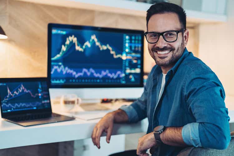 Portrait of a smiling trader