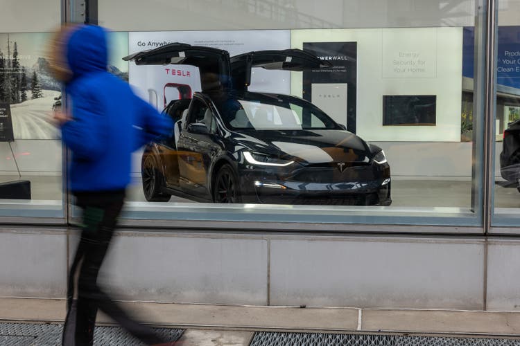 Tesla Reports Quarterly Earnings