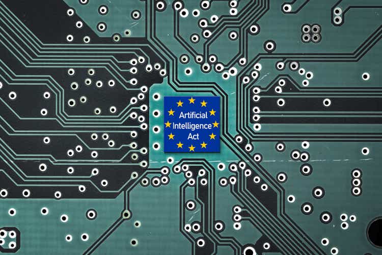 Flag of European Union on a microprocessor, CPU or GPU microchip on a motherboard. AI Act