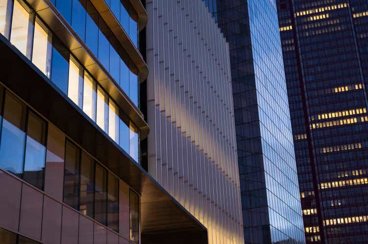 Close-up of modern office facades at business district at dawn