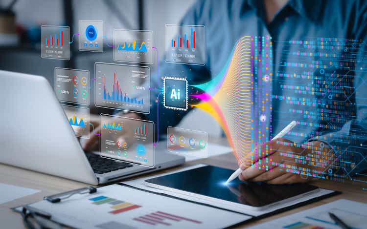 Data science and big data with AI technology.  An analyst or scientist uses a computer and a dashboard to analyze information about complex data sets on the computer.  Insights Development Engineer