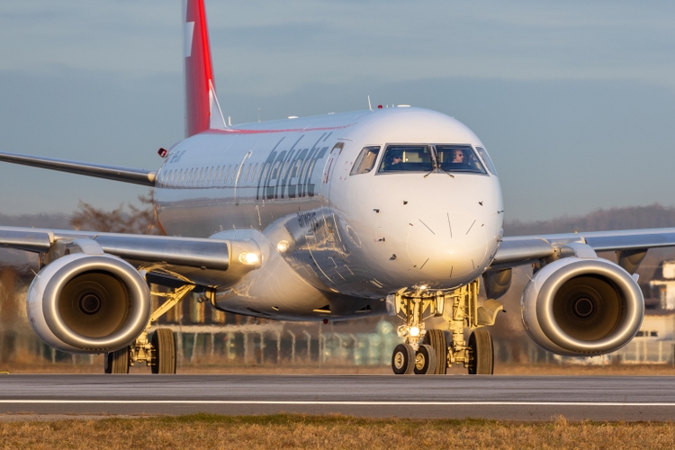 Jet airplane of Helvetic Airways from Switzerland on the runway for takeoff