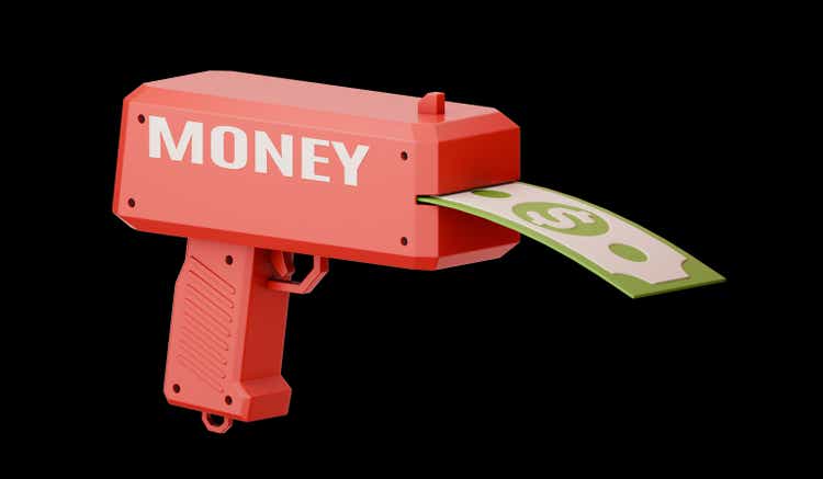 Red money gun with a dollar bill