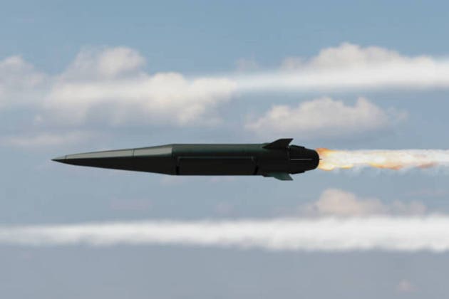 Military missile in the sky above the clouds, a trace of a missile launch. Concept: air defense by military complexes, military aid, protection of the sky.