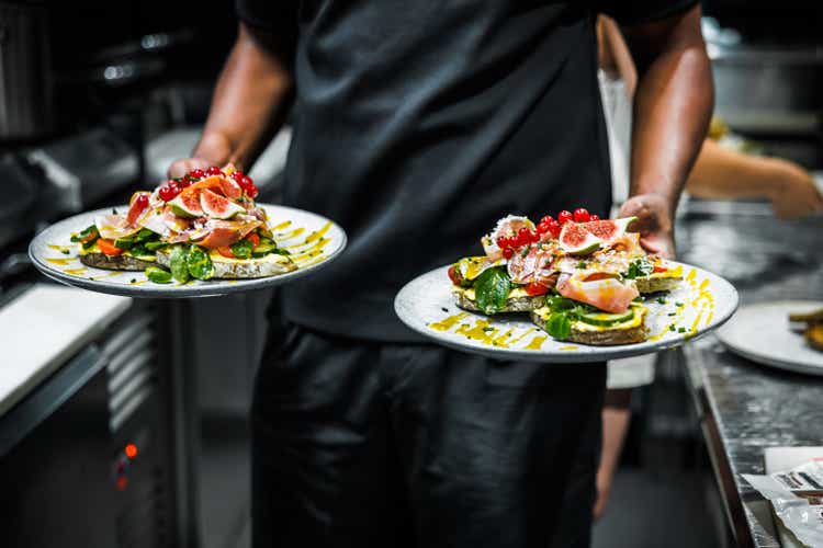 Chef Serving Gourmet Toast Delights