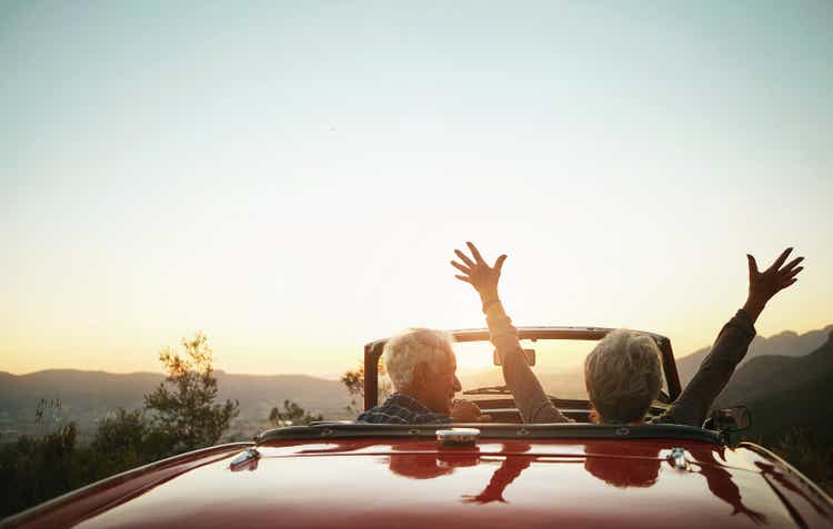 Shot of a joyful senior couple enjoying a road trip