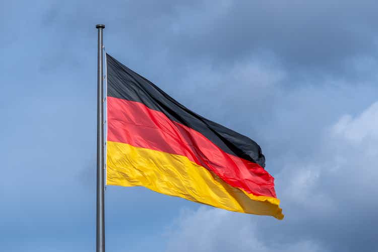 German flag against cloudy sky