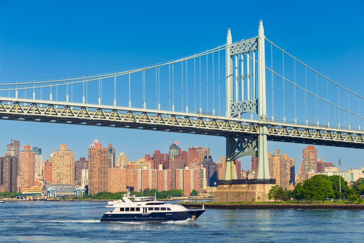 RFK Triborough Bridge and New York City Skyline with Skyscrapers of Manhattan Upper East Side in the Morning, New York, USA.