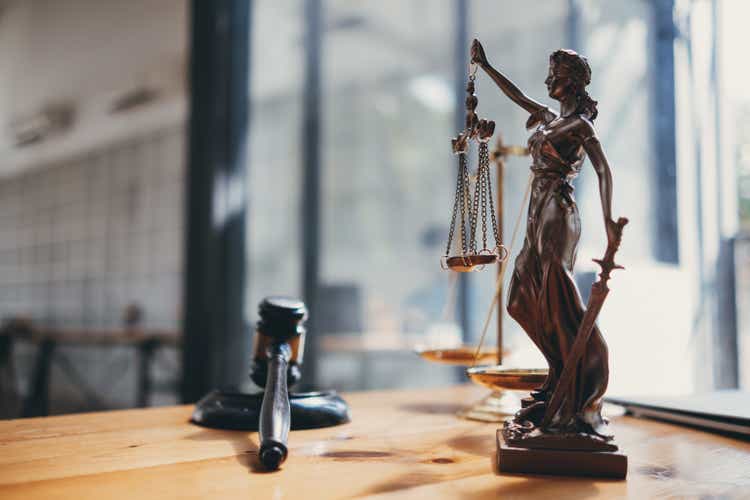 statue of god Themis Lady Justice is used as symbol of justice within law firm demonstrate truthfulness of facts and power to judge without prejudice. hemis Lady Justice symbol of honesty and justice.