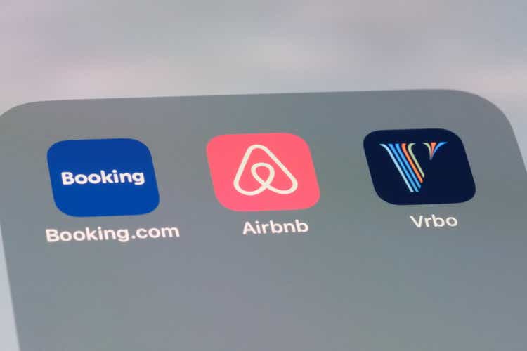 Airbnb, Booking.com and Vrbo apps. Assorted online rental brands