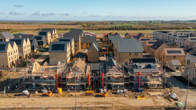 Drone view of a residential building site under construction