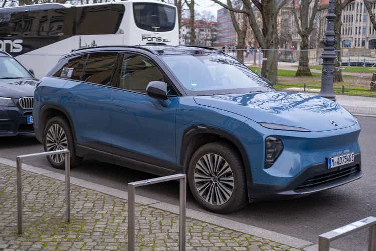 blue stylish modern Nio EL7 car on street of Berlin, eco-friendly Electric vehicle in urban environment, automotive industry, sustainable transportation, Berlin, Germany - February 18, 2024