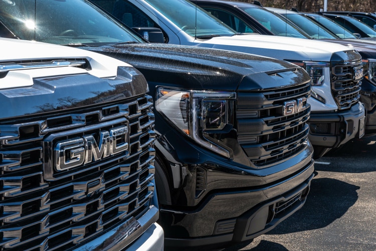 A dealership in Monroeville, Pennsylvania, USA with GMC pickup trucks for sale