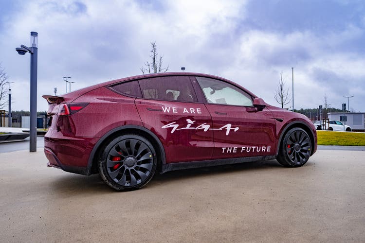 tesla model y midnight cherry red, gigafactory berlin brandenburg grünheide, location in Europe, our most advanced, sustainable and efficient facility yet in Berlin, Germany - February 19, 2024