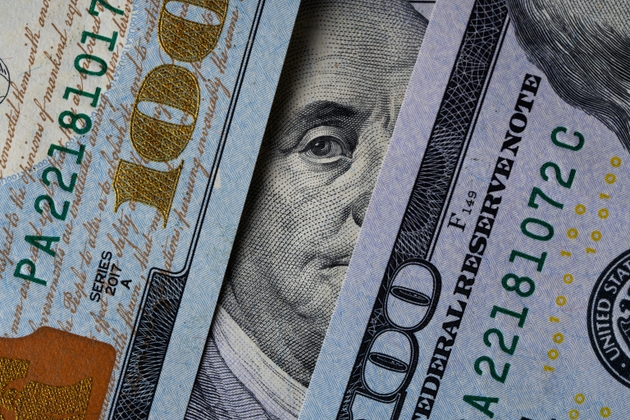 Benjamin Franklin"s look on a hundred dollar bill. Benjamin Franklin portrait macro usa dollar banknote or bill.