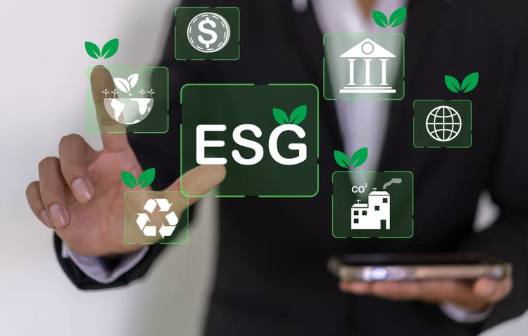 Hand holding global ESG icon of saving clean energy environmental, social, governance, sustainable and corporation development, green eco friendly, environment, go green, CO2, ESG concept on green