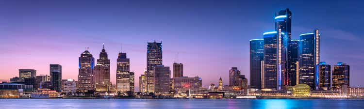 Detroit Michigan downtown urban buildings and city skyline at night panorama