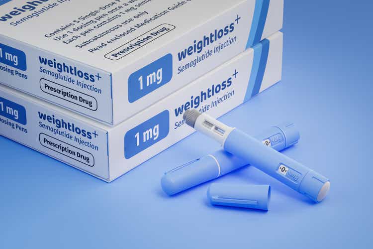 Two packages of a fictitious Semaglutide drug used for weight loss (antidiabetic or anti-obesity medication) on a blue transparent background. Fictitious package design. Two dosing pens in front.