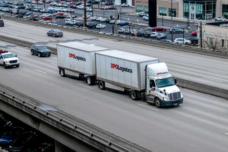 XPO Logistics semi-truck driving on Interstate 90 in Spokane, Washington USA.