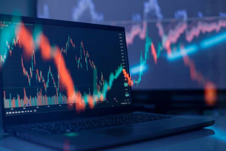 Investment, trade, stock, finance and analysis concept. Business graph charts of financial board display candlestick double exposure