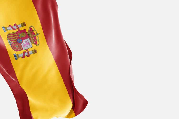 National flag of Spain flutters in the wind.