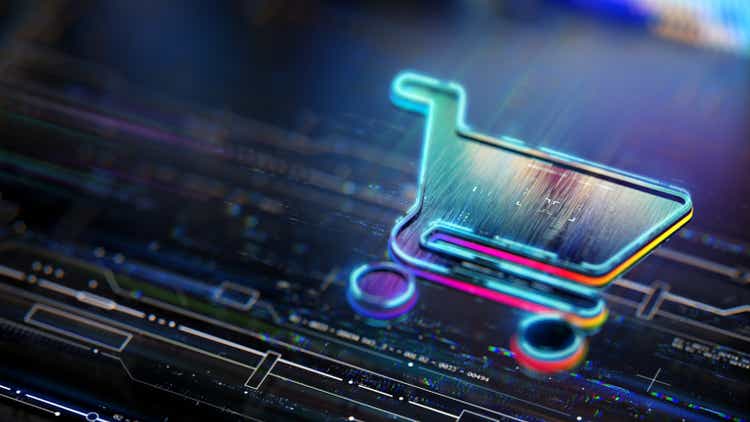 Online shopping concept. Digital shopping cart icon in the center of CPU & circuit board with vibrant data transfers, representing evolving shopping and marketing technologies