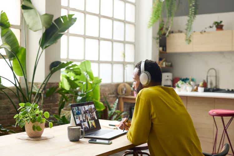 Entrepreneur working on laptop at home