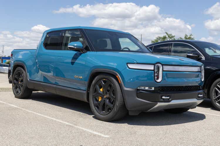 Rivian R1T EV pickup truck display. Rivian offers the R1T in Adventure, Adventure All-Terrain and Launch editions. MY:2023