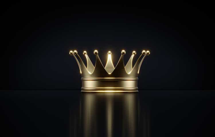 Gold Colored Crown On Black Background