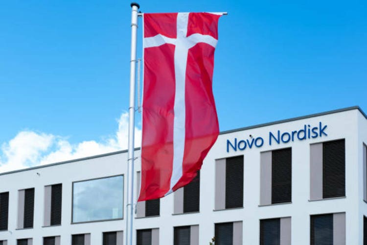 Novo Nordisk advertising flags and logo on facade building, Danish pharmaceutical healthcare giant, production innovative drugs, Ozempic, Mainz, Germany June 15, 2024