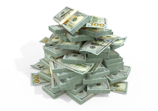 Stacks of US dollar notes. bundles of United States currency bills isolated on white background