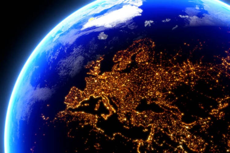 Earth planet on blue night sky with stars