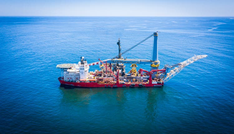 Drone shot of a drillship in the open ocean