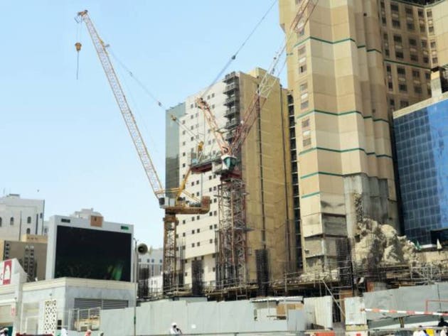 A new building under construction, with crane towers in Makkah city near Al Haram and the Kaaba, new developmental projects in the Saudi Arabia kingdom