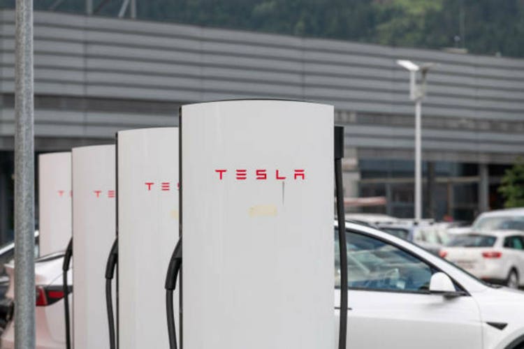 Charging station for electric cars on a parking lot. Tesla technology. 22 july 2024, Imst, Austria