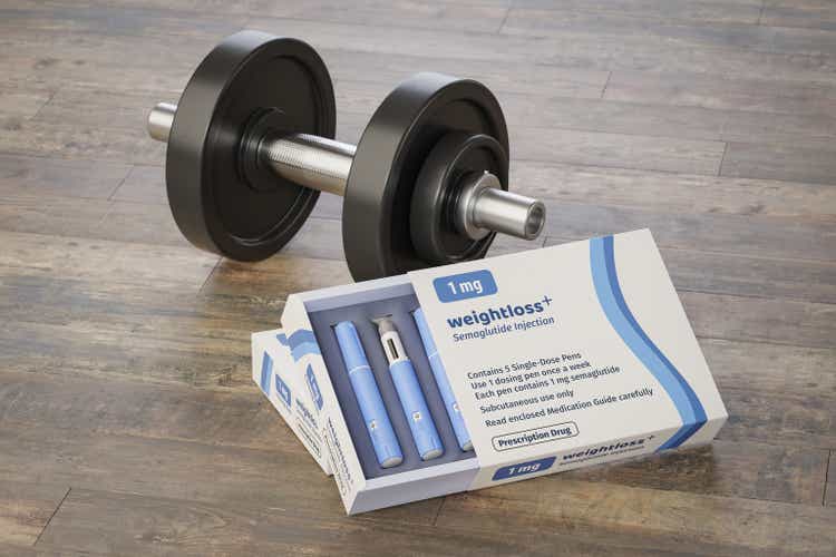 Concept for alternatives ways for loosing weight. Two packages (fictitious design) of dosing pens of a fictitious Semaglutide drug used for weight loss. In the back a dumbbell for exercising.